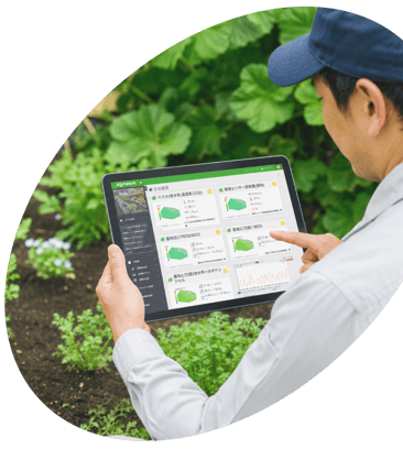 タブレットで栽培データを確認する生産者の写真